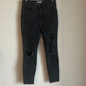 Black distressed skinny jeans